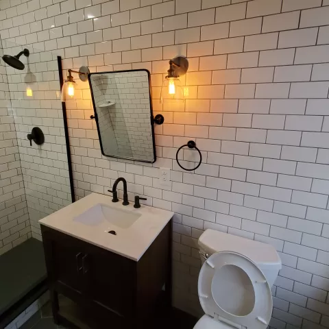 Modern bathroom with white subway tiles