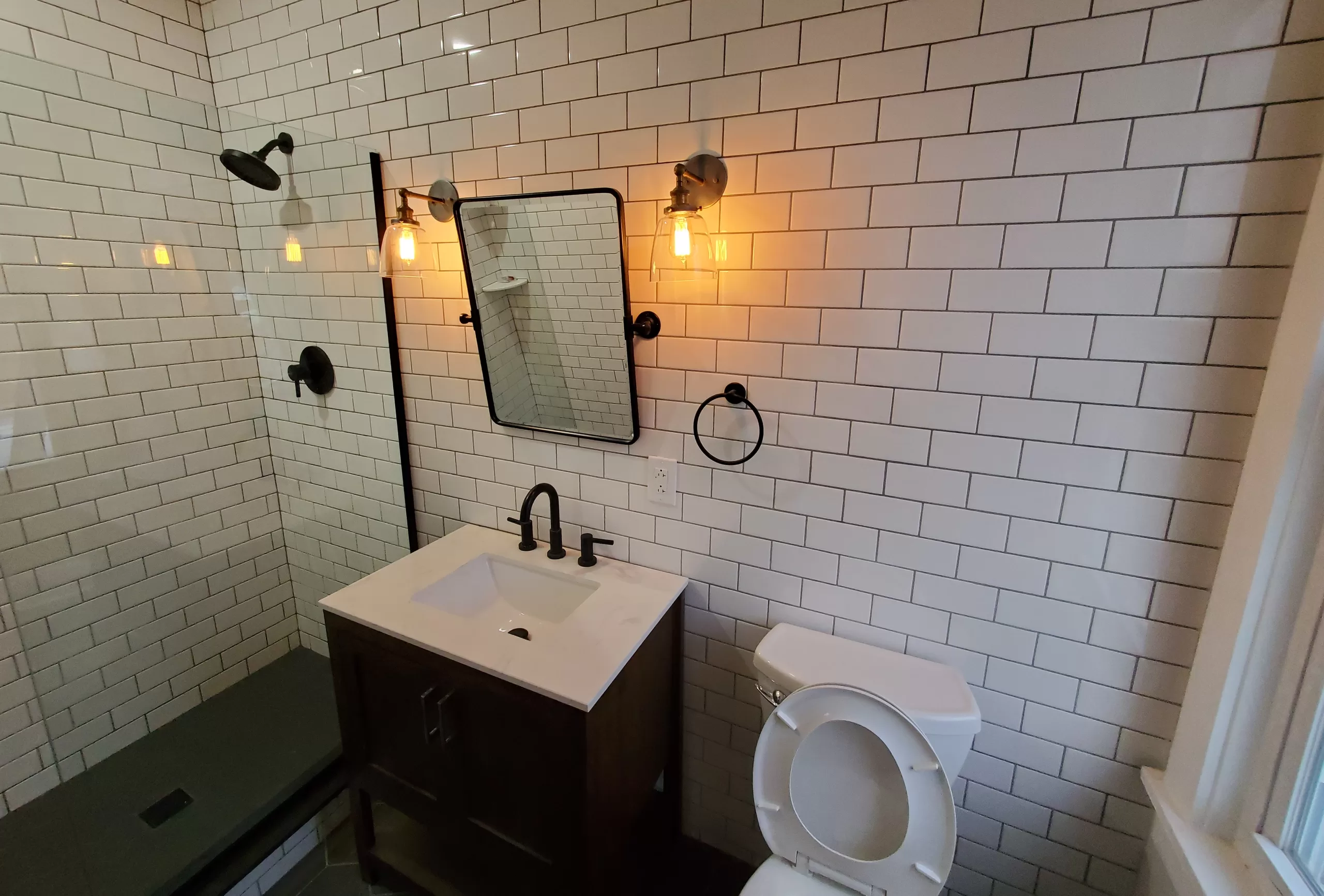 Modern bathroom with white subway tiles