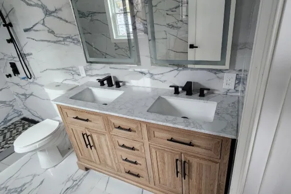 Vanity with black faucets