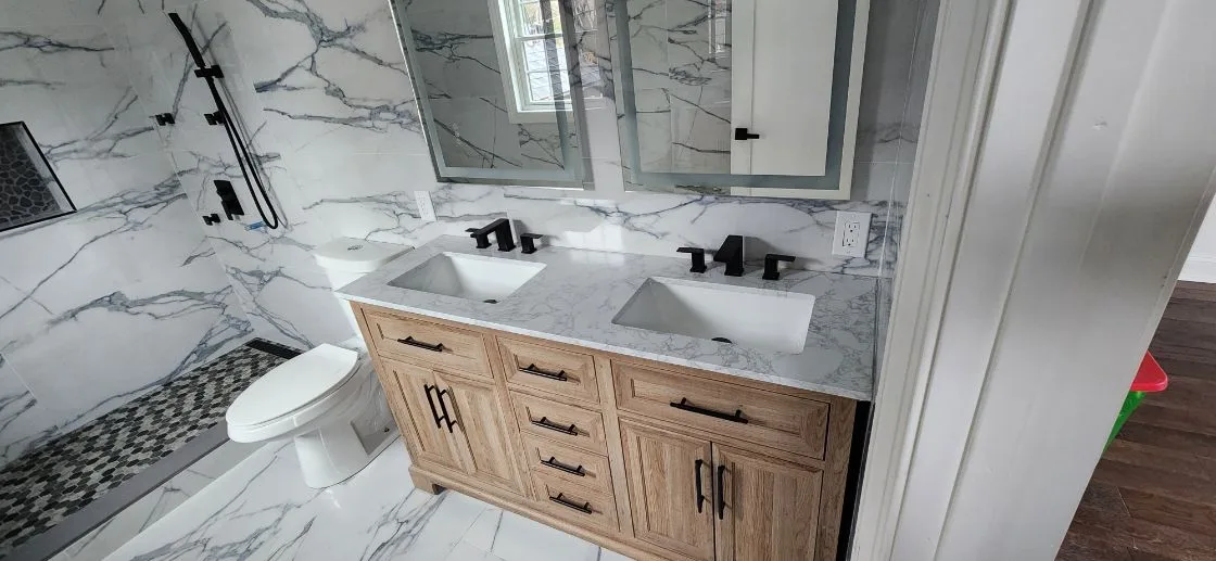 Vanity with black faucets